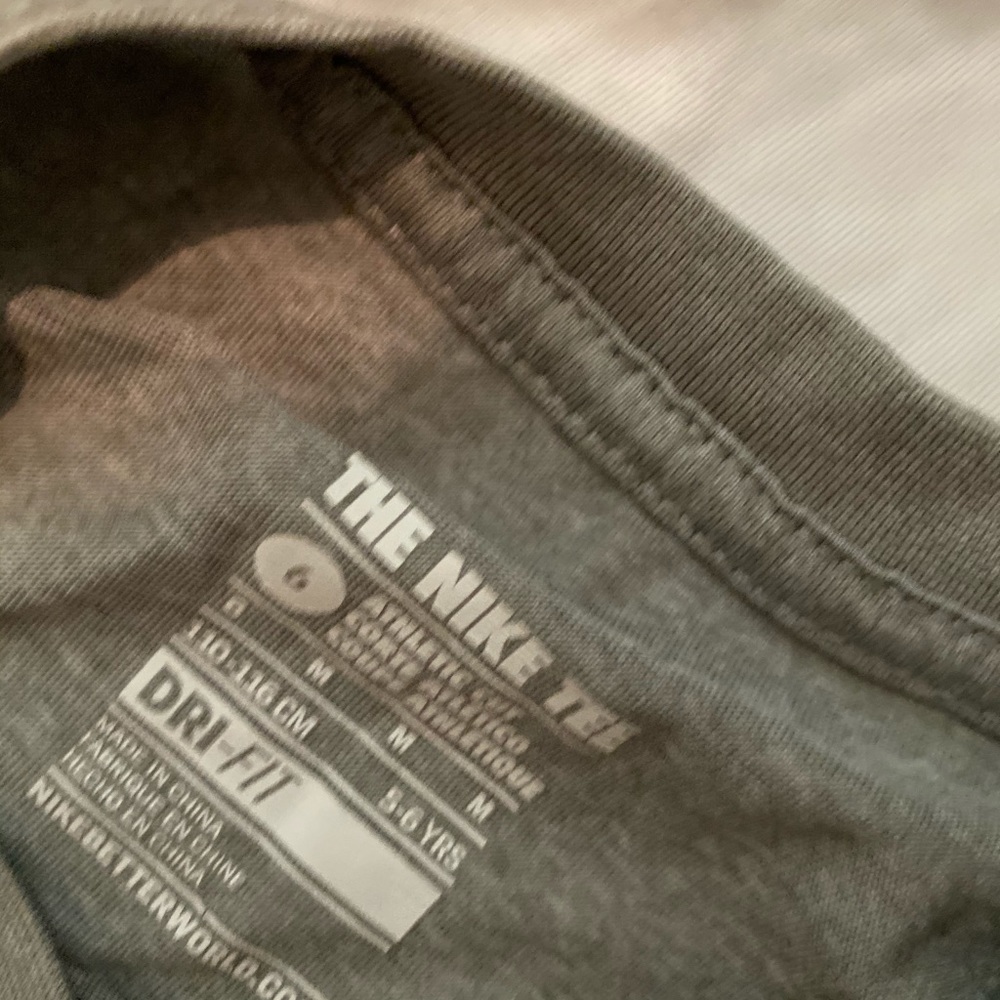 Bundle of boys under Armour and nike shirts